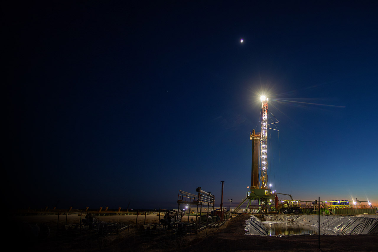 Drilling rig at dusk